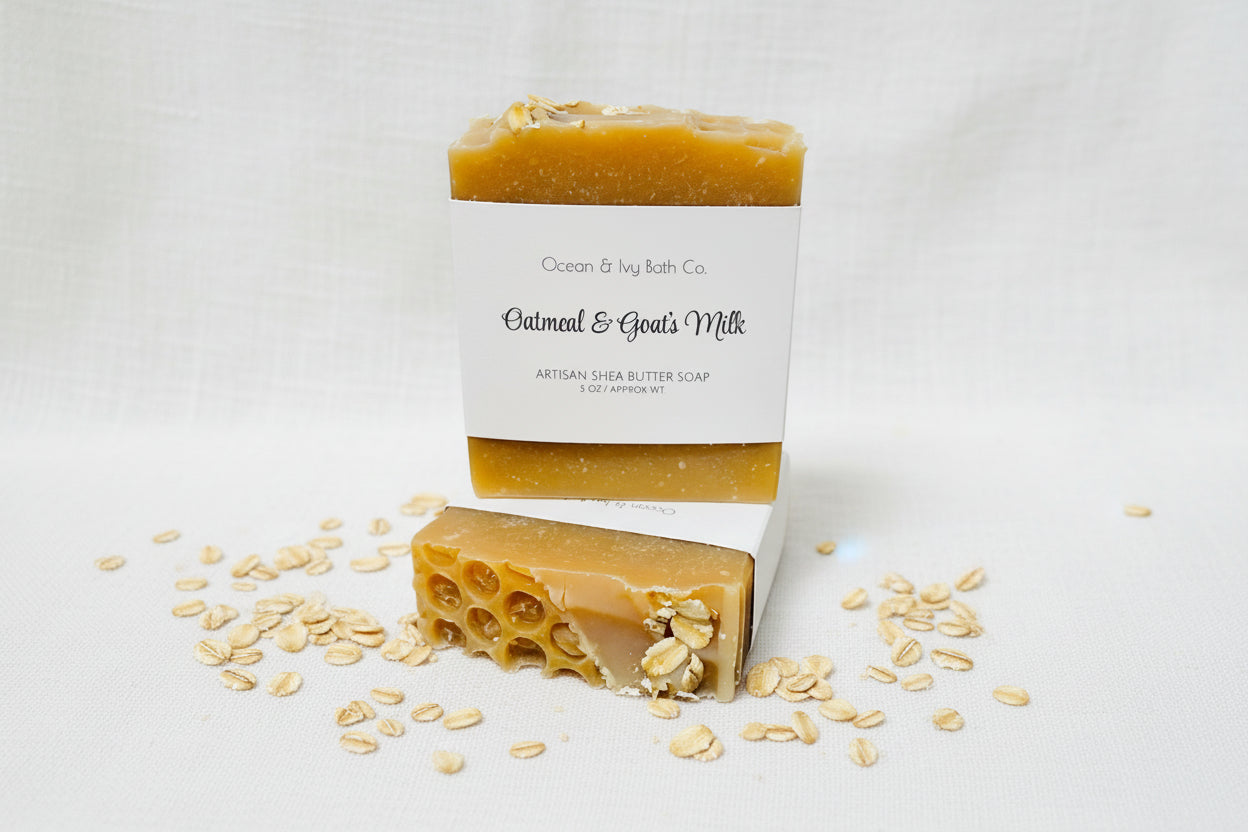 Bar of soap with a visible honeycomb design and 'Oatmeal & Goats Milk' label on a white background