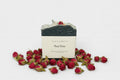 Artisan soap bar with decorative elements on a white background, featuring the brand 'Ocean & Ivy Bath Co'.
