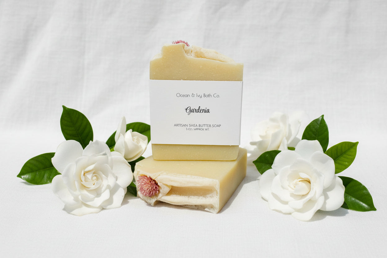 Two bars of soap with a visible brand label on a white background