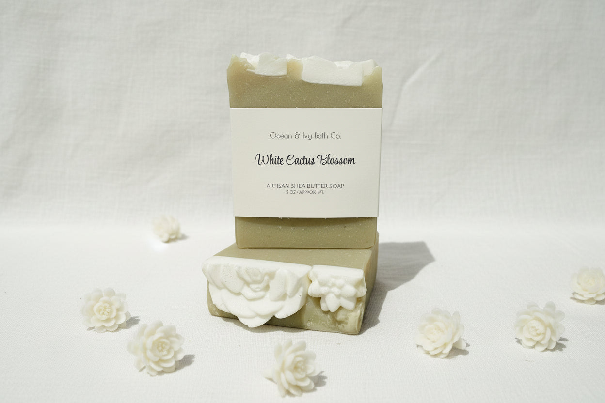 Bar of soap with decorative white cactus design on a white background